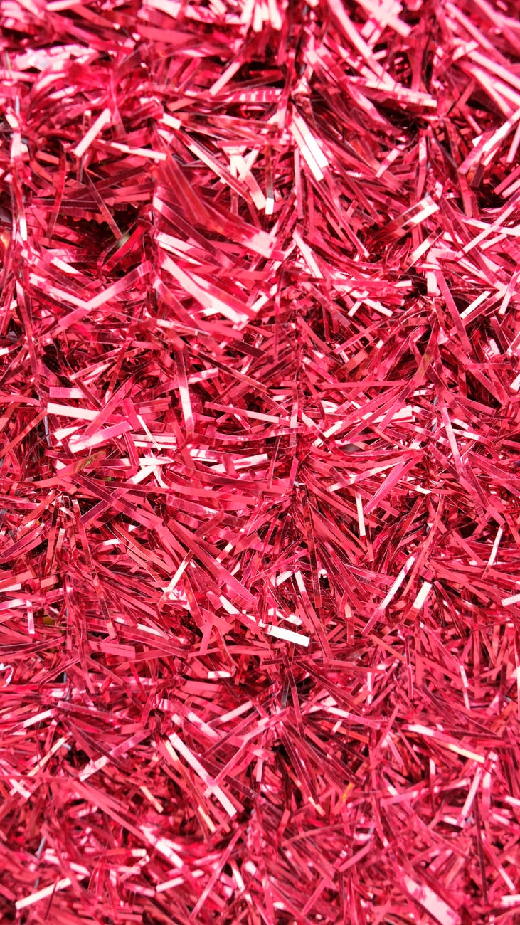 chaotic red bright sparkling tinsel on festive event