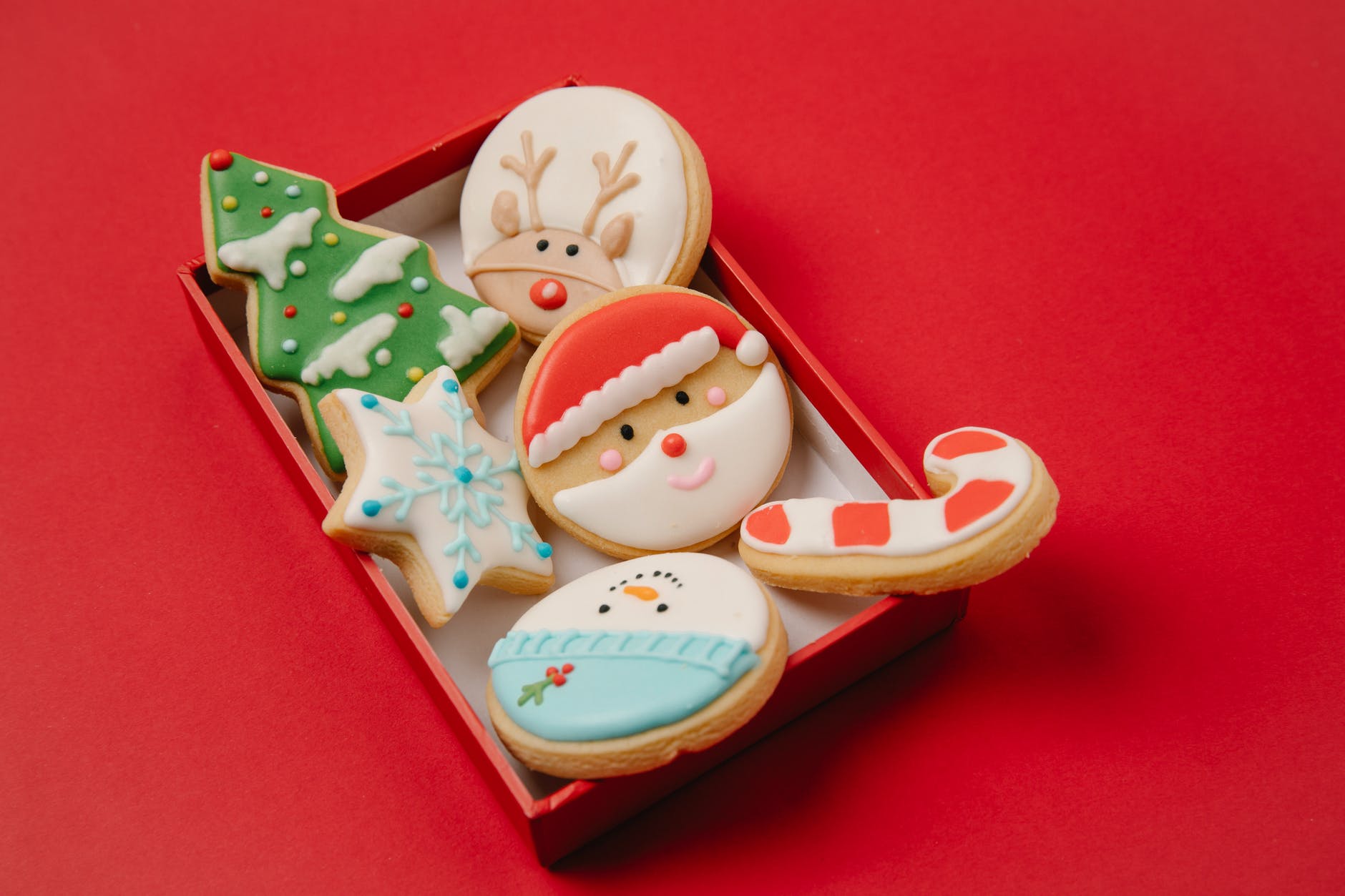 homemade festive cookies in box on table